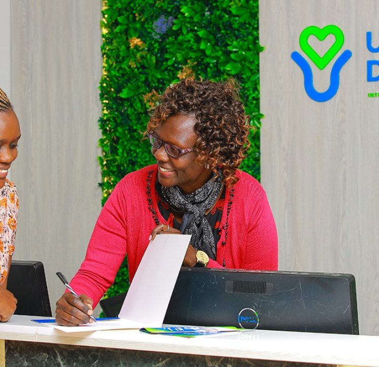 Patient receiving assistance at UDC Ultra Diagnostic Center reception in Nairobi